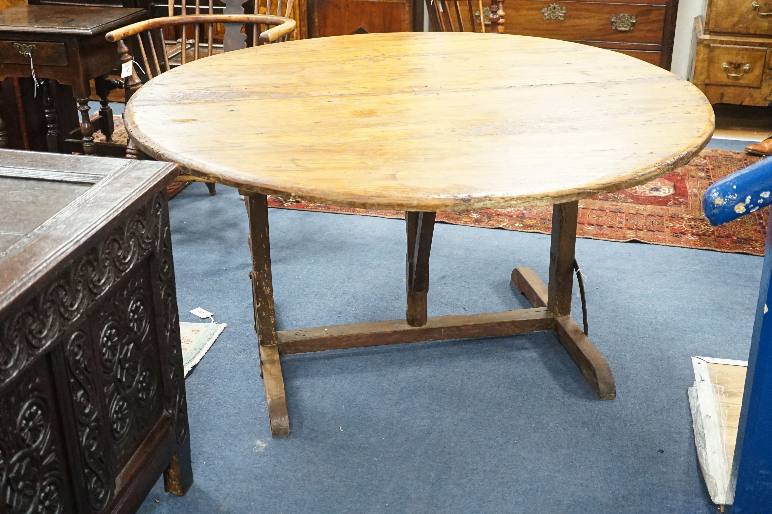 A Vendange 19th century fruitwood table, diameter 136cm, height 68cm
